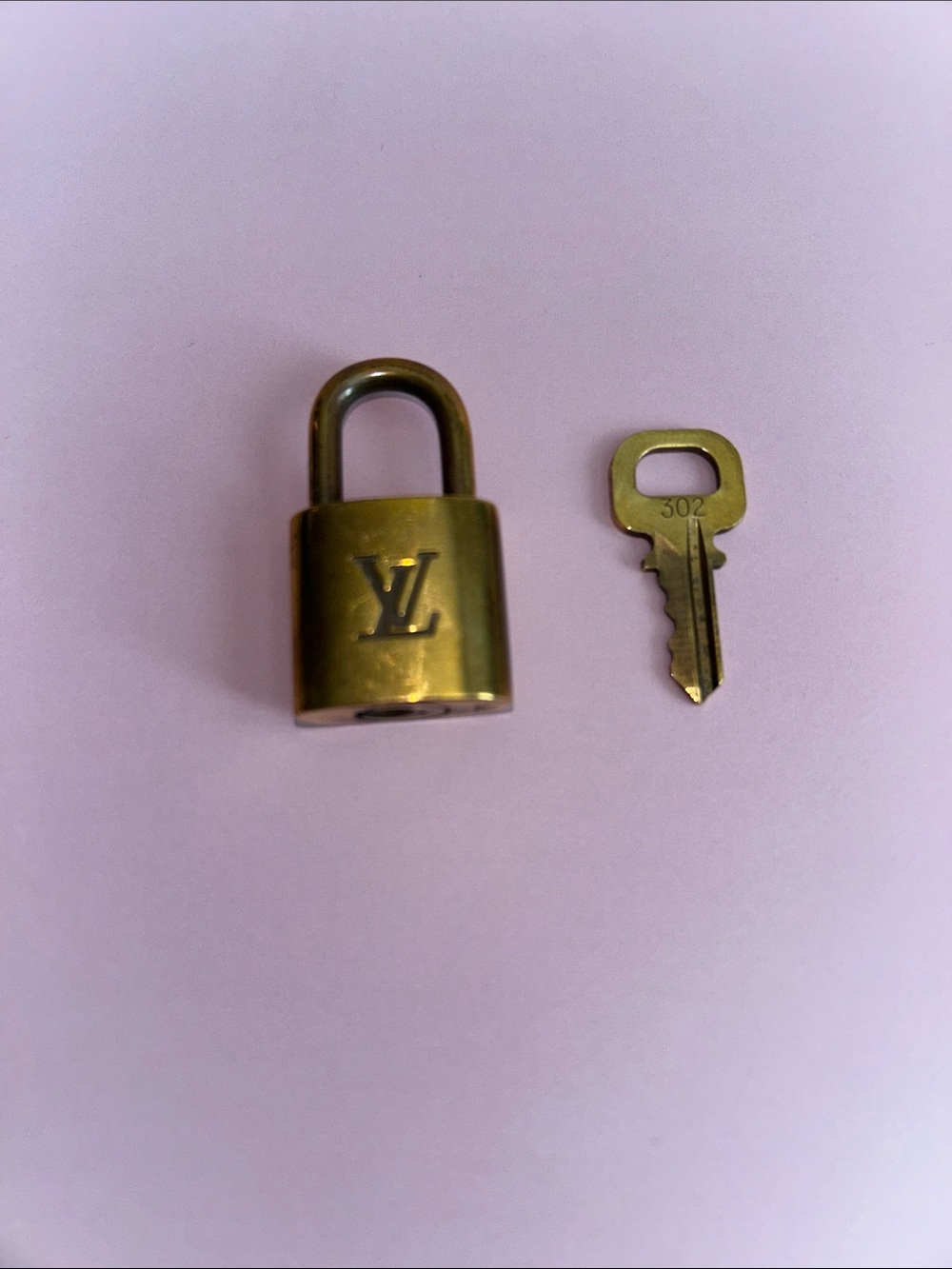 Louis Vuitton Lock & Key #302 Authentic